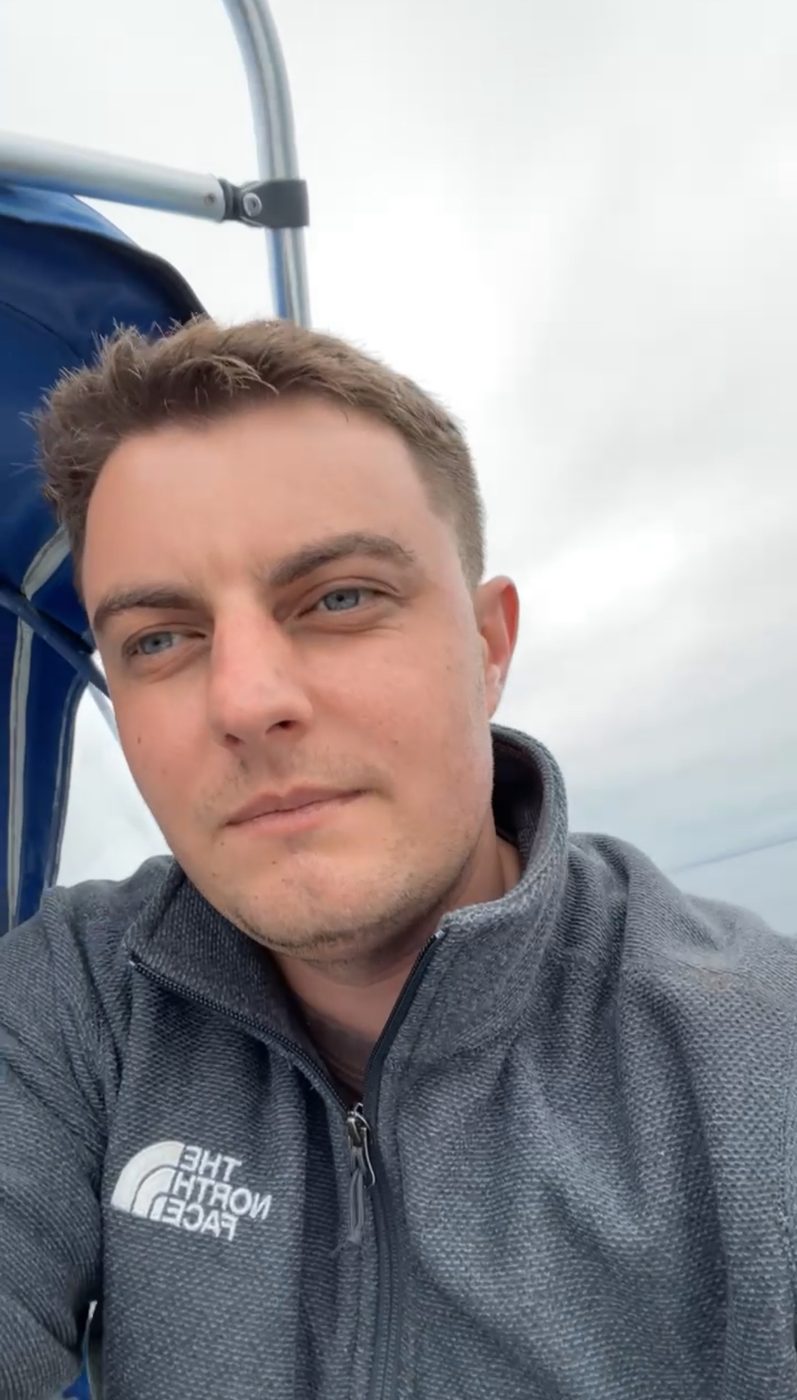 James Permenter on a boat off the California coast